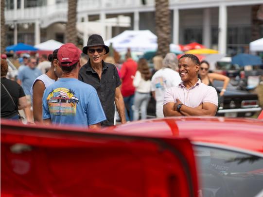 People enjoying the Bama Coast Cruisin's fall car show at Freedom Fest, free festival in Orange Beach