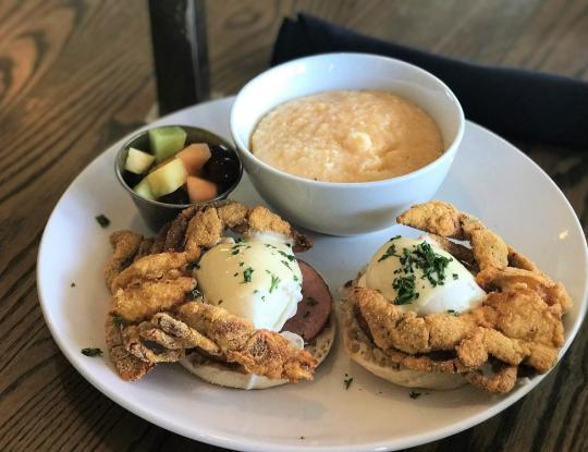 Crab eggs Benedict and grits