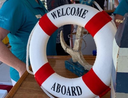 welcome aboard life ring orange beach