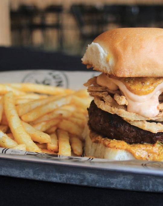 Burger and fries on a tray