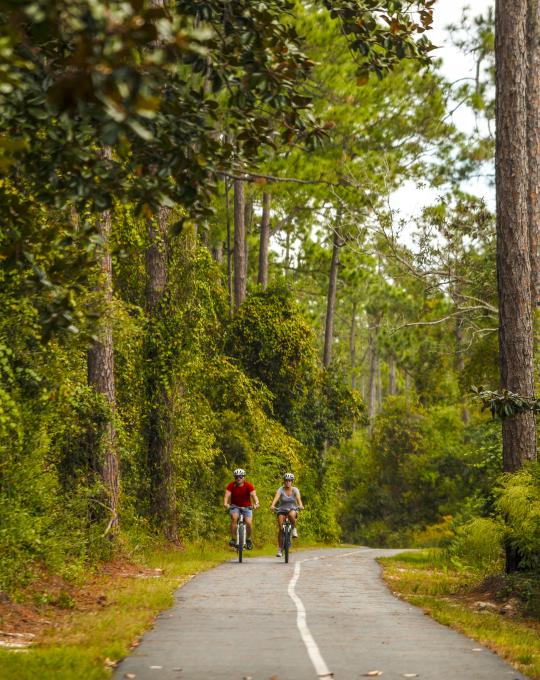 Couple biking on Hugh S. Branyon Backcountry Trail