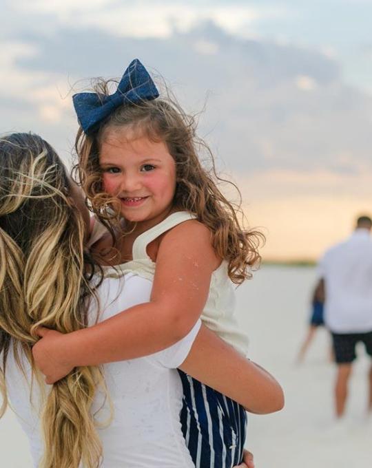 Family portrait on the beach in Gulf Shores, AL