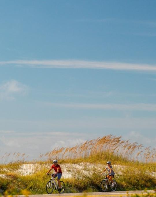 riding bikes along the beach in Gulf Shores AL
