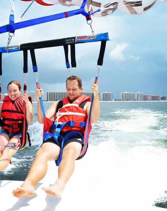 a couple parasailing in gulf shores al