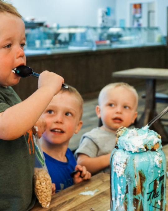 little boys eating ice cream at The Yard Gulf Shores
