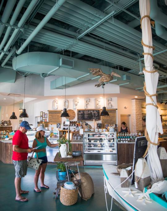Couple inside Southern Grind at Hotel Indigo in Orange Beach, AL