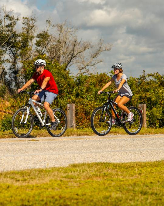riding bikes along the beach in Gulf Shores AL