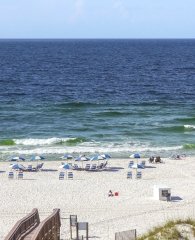 Aerial view of beach from a balcony at a Gulf-front hotel in Orange Beach