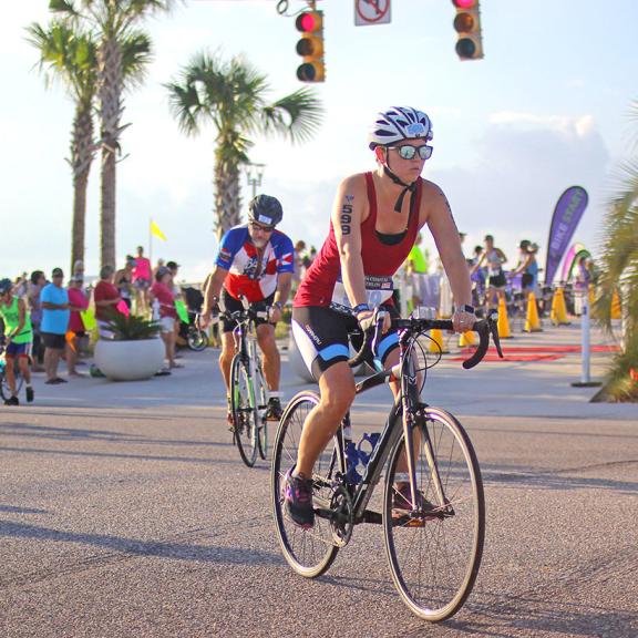 Bike riders compete in Alabama Coastal Triathlon in Gulf Shores AL