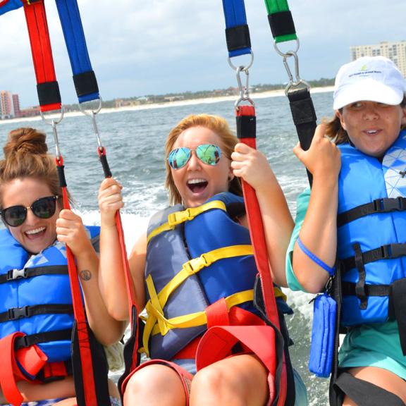 Girls parasailing in Gulf Shores, AL