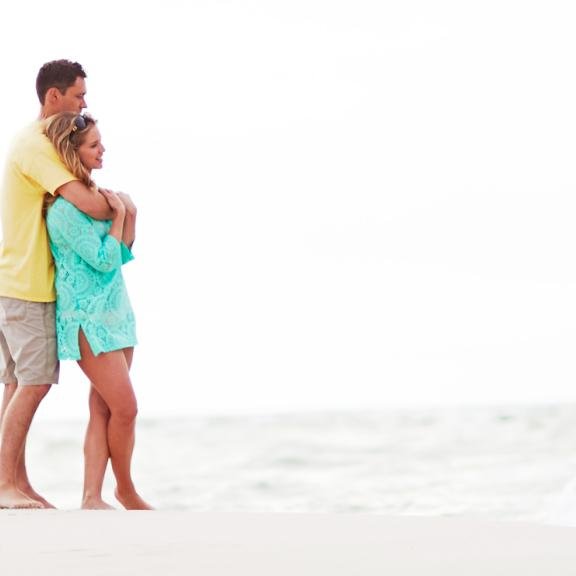 Couple on Alabama's white sand beaches