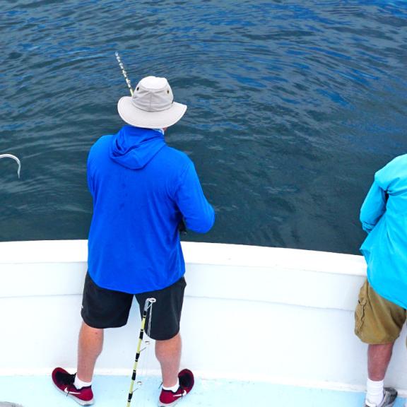 Group of men charter fishing in Orange Beach