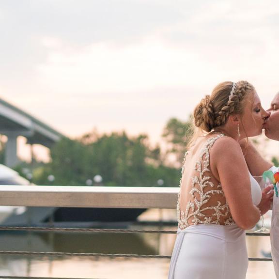 Couple getting married at The Wharf in Orange Beach AL