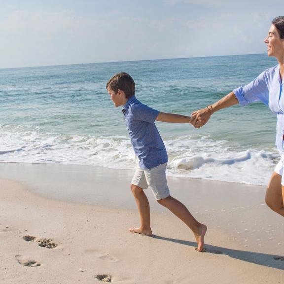 Mom and son on the beach in Gulf Shores, AL