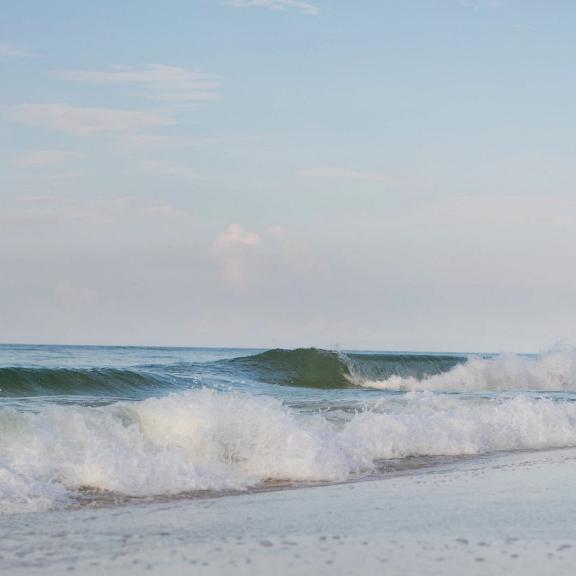 Couple walking on Alabama's beaches