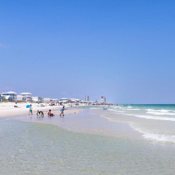 Families on the beach in Gulf Shores, AL