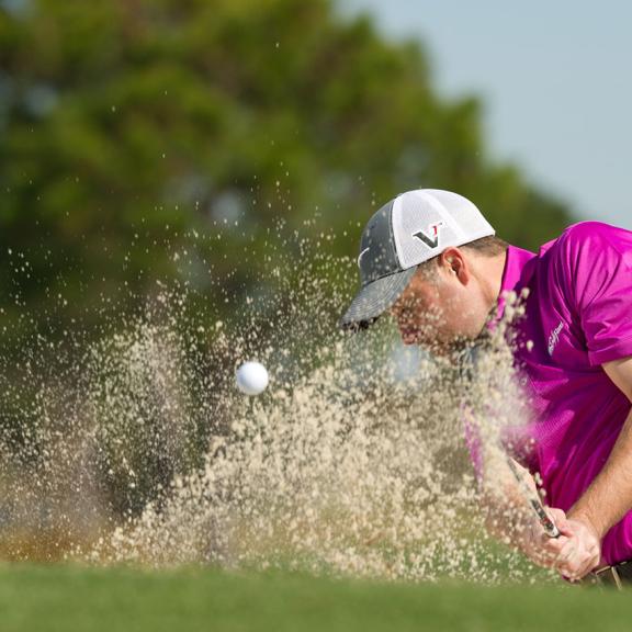 Man golfing in Gulf Shores, AL