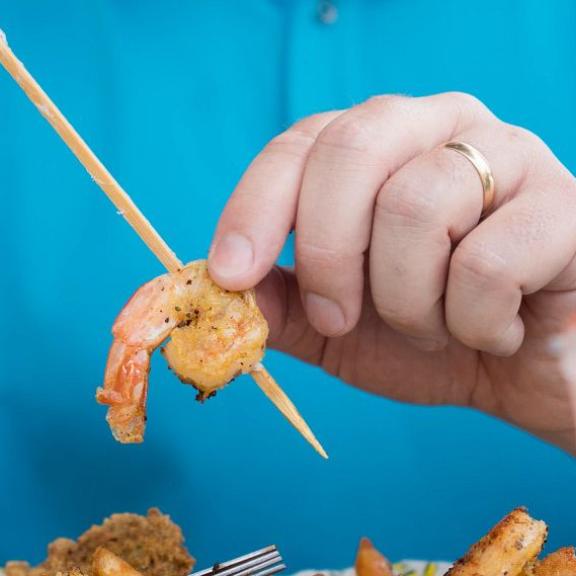 Man eating at LuLu's in Gulf Shores, AL