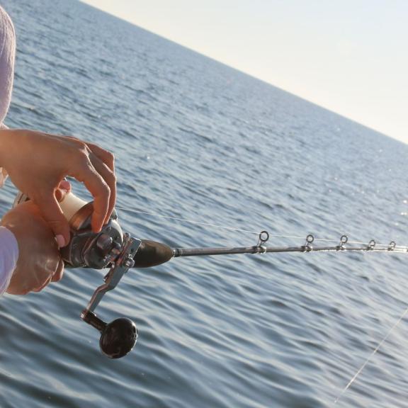 Woman fishing off Alabama's coast