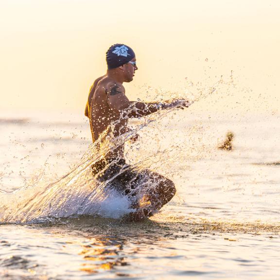 Man running in the Coastal Triathlon on Alabama's Beaches