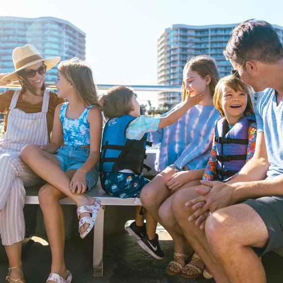 Family on a dolphin cruise in Orange Beach