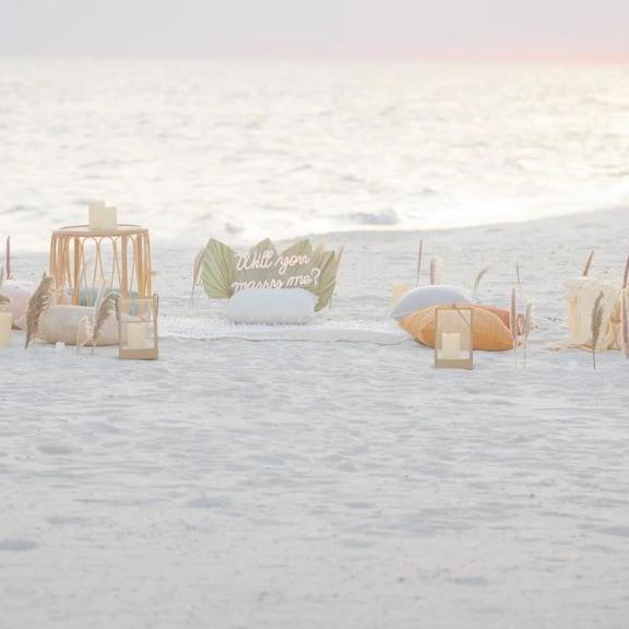 Proposal picnic set up on the beach by Beachside Blankets in Gulf Shores
