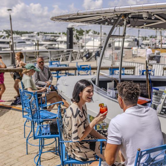 People enjoying an event at The Wharf in Orange Beach