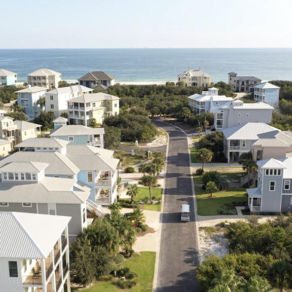Aerial shot of beach houses down Fort Morgan perfect for a snowbirds winter escape