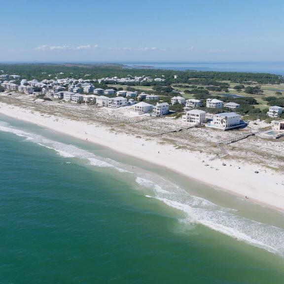 Aerial view of beach houses along the shore in Fort Morgan, Alabama