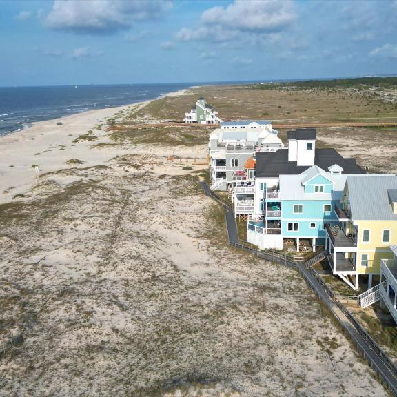 Houses lining the beach in Fort Morgan