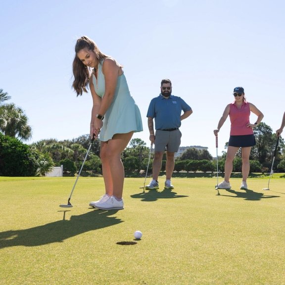 Friends golfing at Kiva Dunes Golf Resort in Fort Morgan
