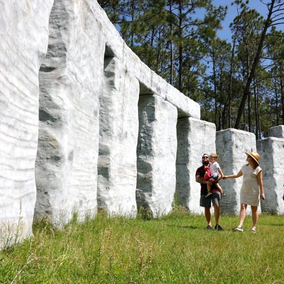 Family exploring Bamahenge, free attractions at Barber Marina in Elberta