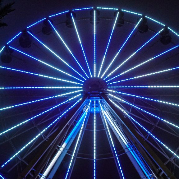 The Wharf Ferris Wheel lit up at night