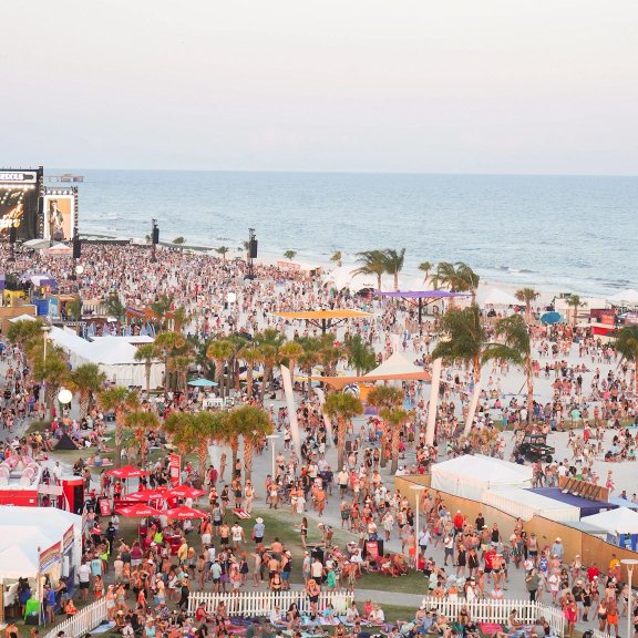 Aerial view of crowd at Sand in My Boots Music Fest in Gulf Shores