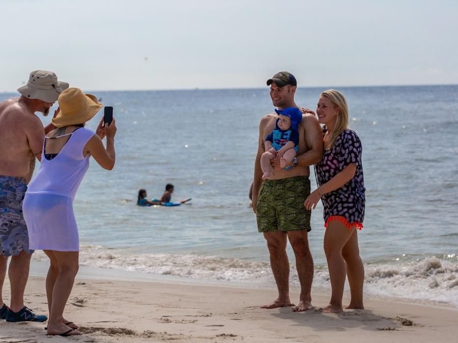 taking family photos in Orange Beach al