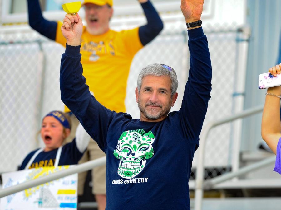 Dad cheering daughter on during NAIA Women's Soccer Championship in Gulf Shores, AL