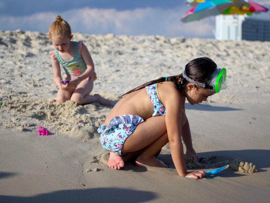 Girls playing on the beaches in Alabama