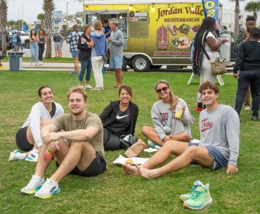 Attendees at The Coastal Alabama Food Truck Festival in Gulf Shores