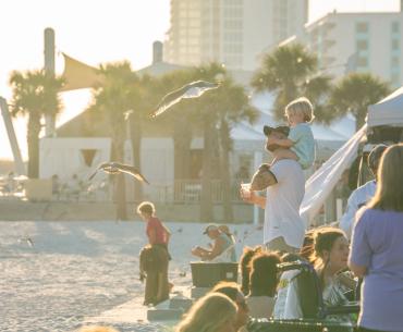 People enjoying Shrimp Fest in Gulf Shores, best beach festival