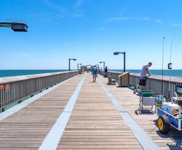 People fishing on the Gulf State Park Pier