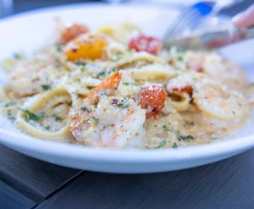 Plate of shrimp pasta at Zeke's Restaurant in Orange Beach