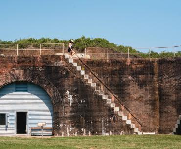 Women walking around Historic Fort Morgan in Gulf Shores 