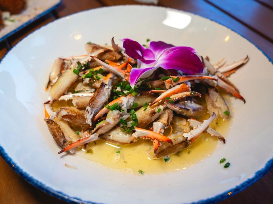 a plate of blue crab claws at Coastal seafood restaurant in Orange Beach