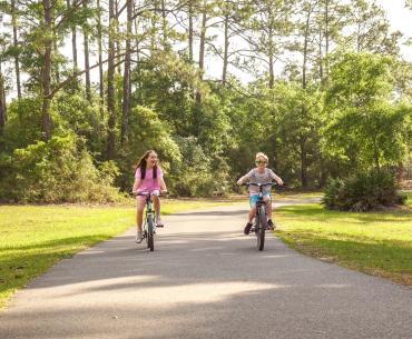 Kids biking in Gulf State Park
