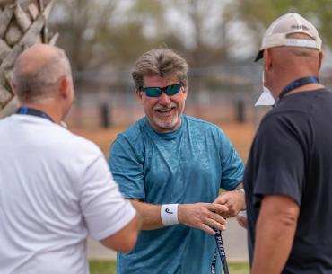 pickleball players chatting at a pickleball tournament in gulf shores