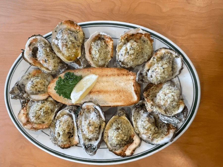 plate of chargrilled oysters at Original Oyster House seafood restaurant in Gulf Shores