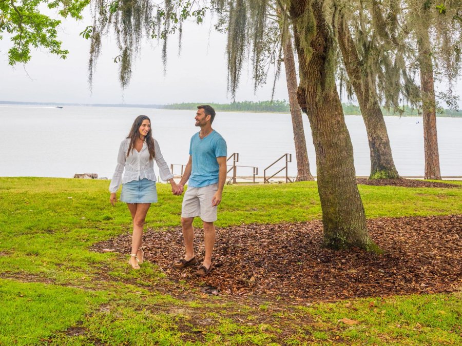 Couple walking at Waterfront Park in Orange Beach
