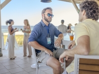 Meeting attendees enjoying a drink at CoastAL on Alabama's Beaches