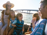 Family enjoying a dolphin cruise in Orange Beach