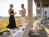 Attendees having a cocktail after the meeting at The Lodge